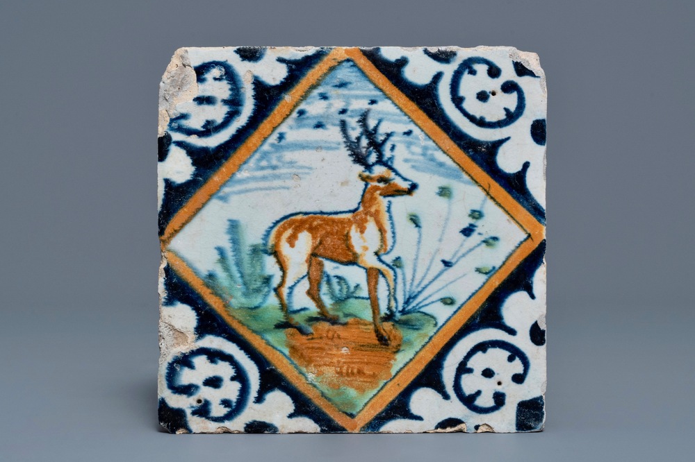 A polychrome Dutch Delft maiolica tile with a deer, ca. 1600